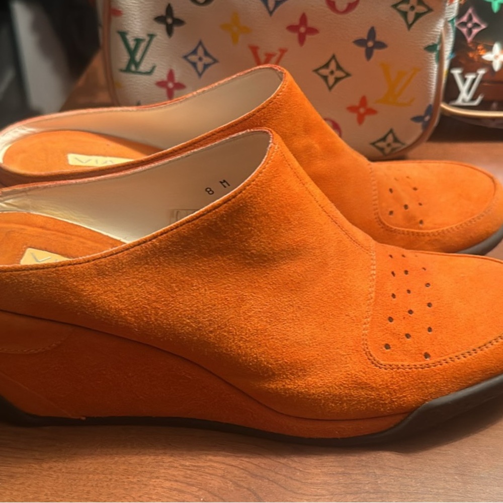 Orange suede slides